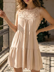 Apricot lace patch halter A-line dress by FJØRNA featuring a fitted bodice and flowing skirt, perfect for elegant occasions.