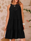 Black lace patch halter A-line dress by FJØRNA featuring a fitted bodice and flowy skirt, perfect for stylish occasions.