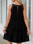 Black lace patch halter A-line dress by FJØRNA, featuring a fitted bodice and flowing skirt, perfect for elegant occasions.