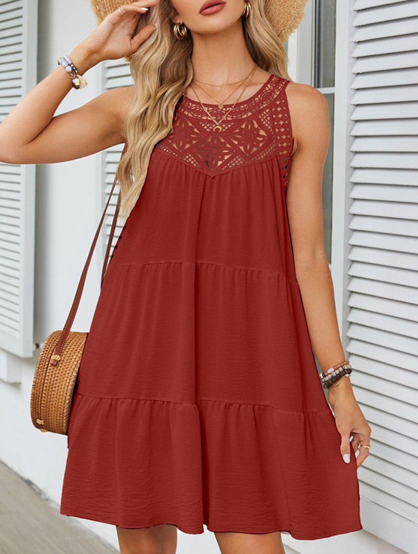 FJØRNA lace patch halter A-line dress in brick color, featuring intricate lace details and a flattering halter neckline.