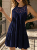 Navy lace patch halter A-line dress by FJØRNA, featuring a fitted bodice, flared skirt, and elegant lace detailing.
