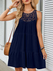 Navy lace patch halter A-line dress by FJØRNA featuring a fitted bodice and flowing skirt, perfect for elegant occasions.