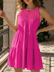 FJØRNA lace patch halter A-line dress in rose color, featuring a fitted bodice and flowing skirt, perfect for elegant occasions.