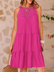 FJØRNA lace patch halter A-line dress in rose color, featuring a fitted bodice and flowing skirt, displayed on a mannequin.