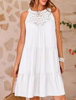 White lace patch halter A-line dress by FJØRNA featuring a fitted bodice and flowing skirt, perfect for elegant occasions.