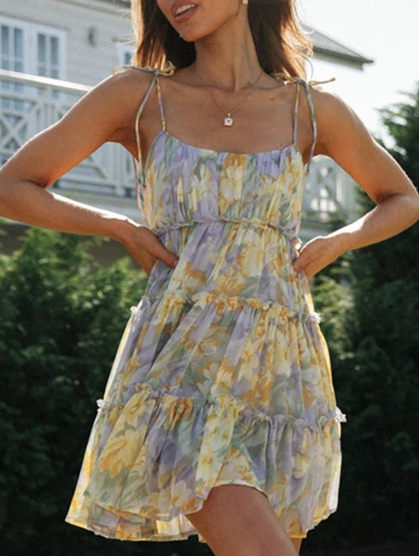 FJØRNA resort style white high-end short dress with sexy print, perfect for summer or vacation wear, featuring a stylish and elegant design.