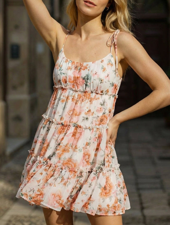 Orange floral print short sleeve dress by FJØRNA, casual wedding dress with a relaxed fit and vibrant floral pattern.