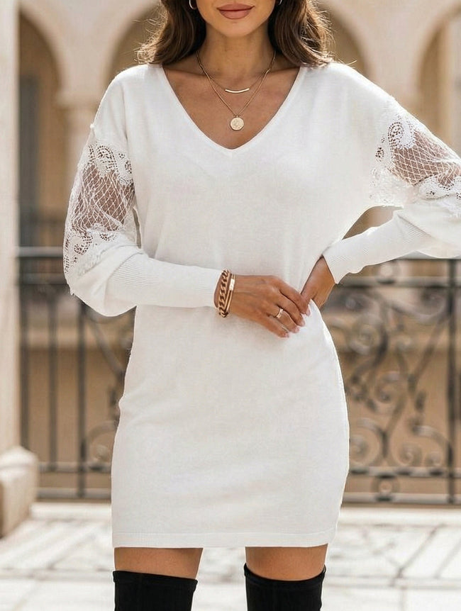 White V neck lace patchwork printed dress by FJØRNA, featuring intricate lace details and a stylish, elegant design.