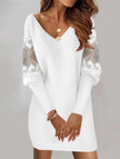 FJØRNA white V-neck lace patchwork printed dress, elegant design with intricate lace details and floral patterns.