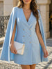 FJØRNA white double-breasted cape blazer dress, front view showcasing the elegant design and structured silhouette.