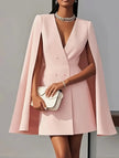 FJØRNA white double-breasted cape blazer dress displayed on a hanger, showcasing the stylish design and elegant silhouette.