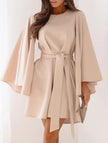 FJØRNA white round neck flare sleeve belted dress with a fitted waist and flowing skirt, perfect for casual or semi-formal occasions.