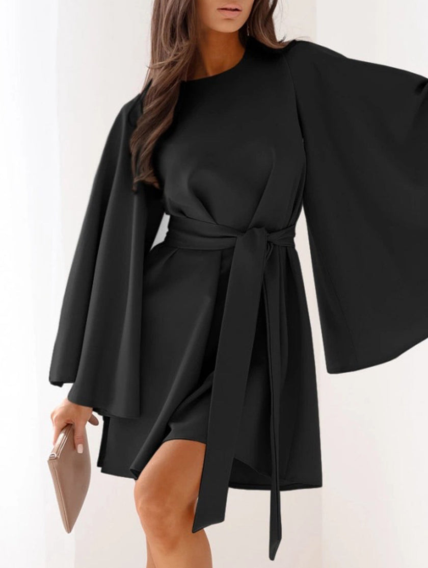 Black round neck flare sleeve belted dress by FJØRNA, featuring a stylish silhouette and waist belt for a chic look.
