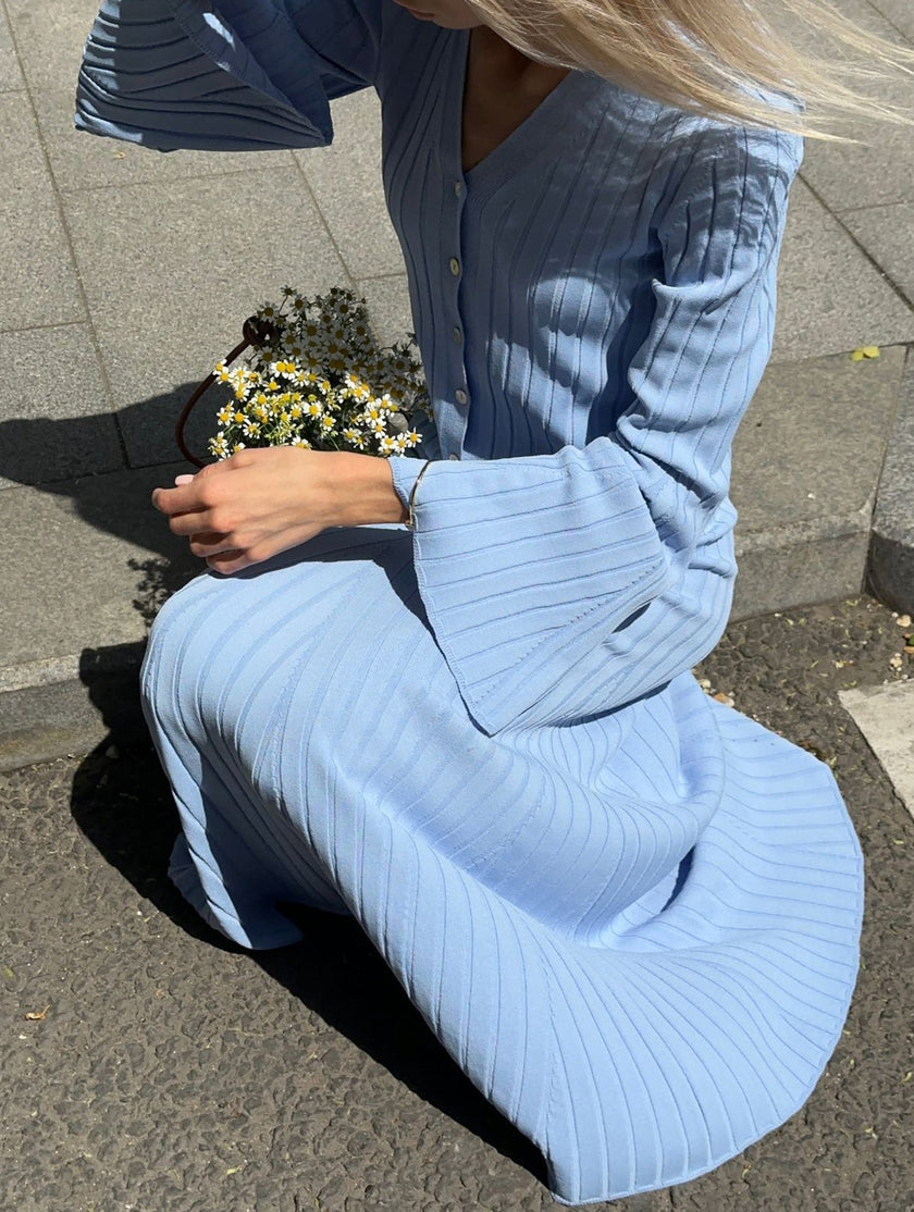 Blue V-neck cardigan slim maxi dress by FJØRNA, flowy and elegant, featuring a fitted waist and long length for a stylish look.
