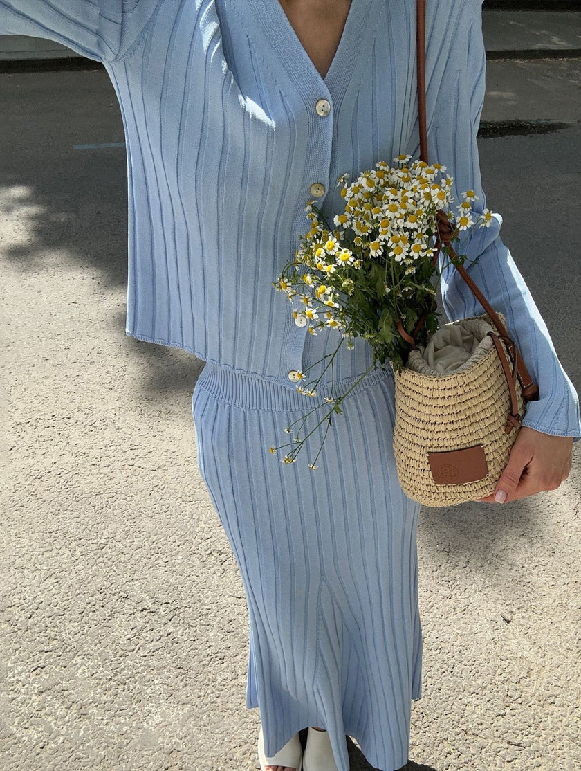 Blue FJØRNA V-neck cardigan maxi dress with a slim fit, flowing design, and long sleeves perfect for casual or elegant occasions.