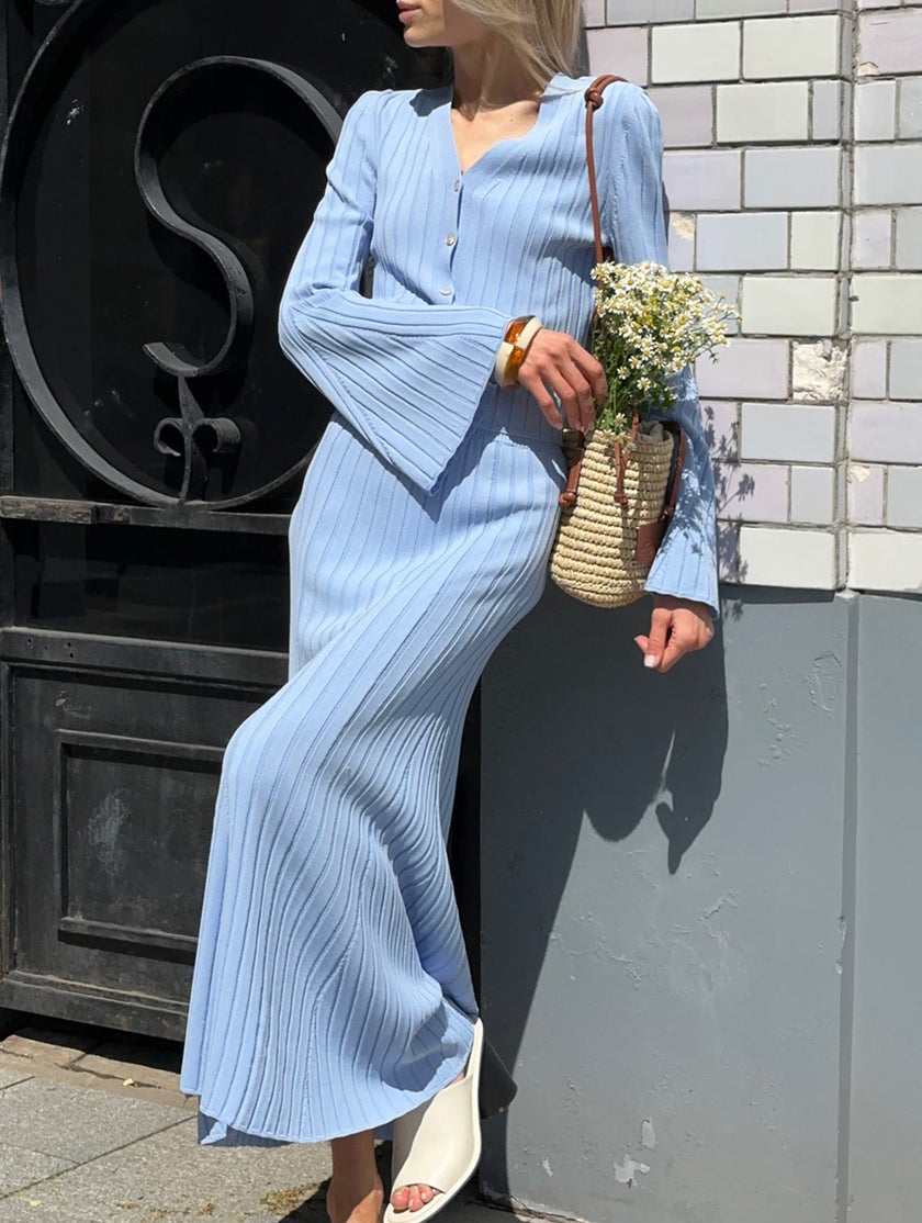 FJØRNA white V-neck maxi dress featuring a slim fit and versatile design, ideal for casual or formal occasions.