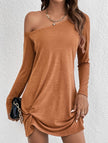 White FJØRNA loose solid long sleeve T-shirt dress shown hanging, casual style with a relaxed fit and simple design.