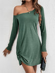 White FJØRNA loose solid long sleeve T-shirt dress hanging on a rack, casual and comfortable for everyday wear.