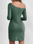 White FJØRNA loose solid long sleeve T-shirt dress hanging on a display mannequin.