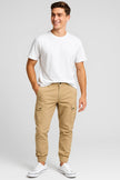 Men's slim-fit cargo jogging pants with multiple pockets, outdoor style, by FJØRNA, shown with fur-lined detail.
