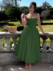 FJØRNA strapless satin corset midi dress with full skirt, sleeveless, fitted, structured design, ideal for wedding guests.