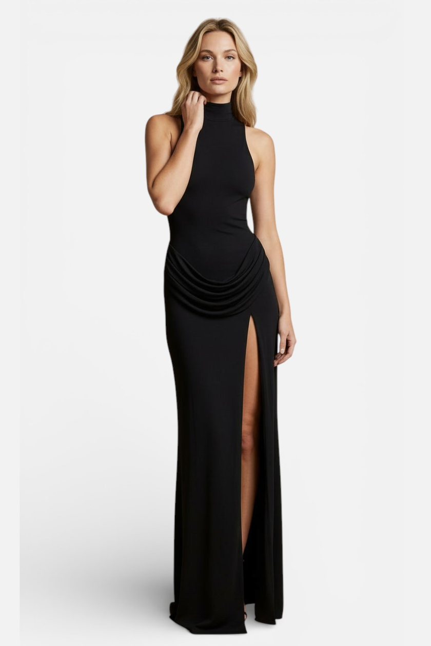 Elegant sleeveless turtleneck maxi dress with thigh split for women, by FJØRNA, styled with flowing fabric and a fitted bodice.