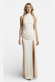 FJØRNA sleeveless turtleneck maxi dress for women with thigh split, elegant design, flowing fabric, and sleek silhouette.