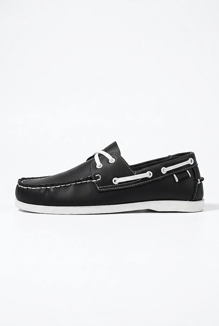 FJØRNA men's boat shoes with PU upper, nautical design, smart casual style, shown in a close-up shot.
