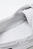 Men's boat shoes by FJØRNA with PU upper, nautical style, smart casual design, shown in a refined spring color.