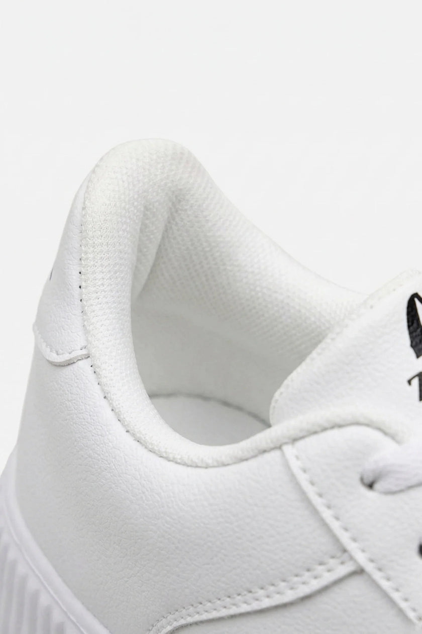 White men's walking shoes by FJØRNA featuring breathable material, cushioned support, and lightweight casual design.