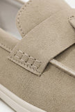 FJØRNA men's slip-on loafers with PU finish, showcasing a sleek, casual shoe design in black on a neutral background.