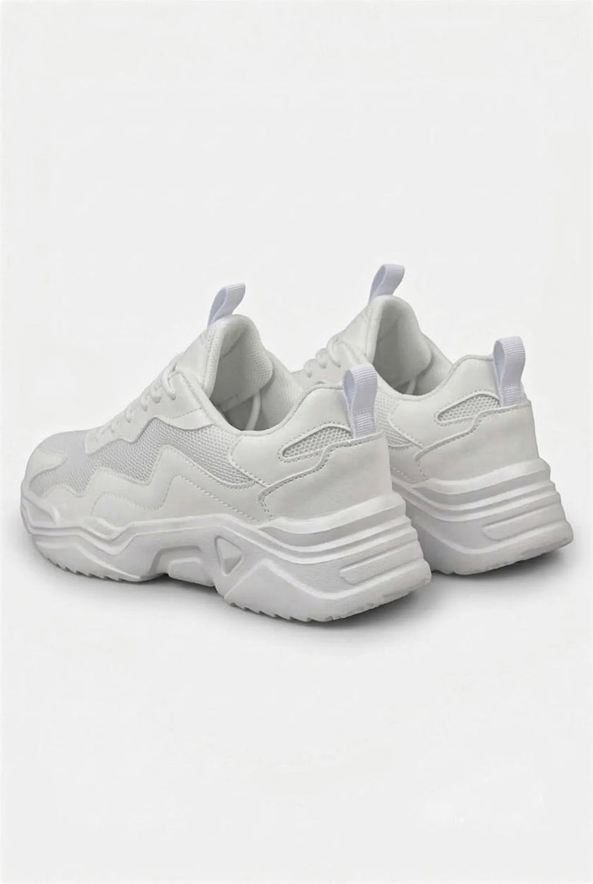 White mesh trainers for women by FJØRNA, lightweight and breathable casual shoes with a comfortable fit.