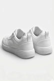 White minimalist women's trainers by FJØRNA, casual and timeless shoes with clean design, featuring white sneakers for everyday wear.