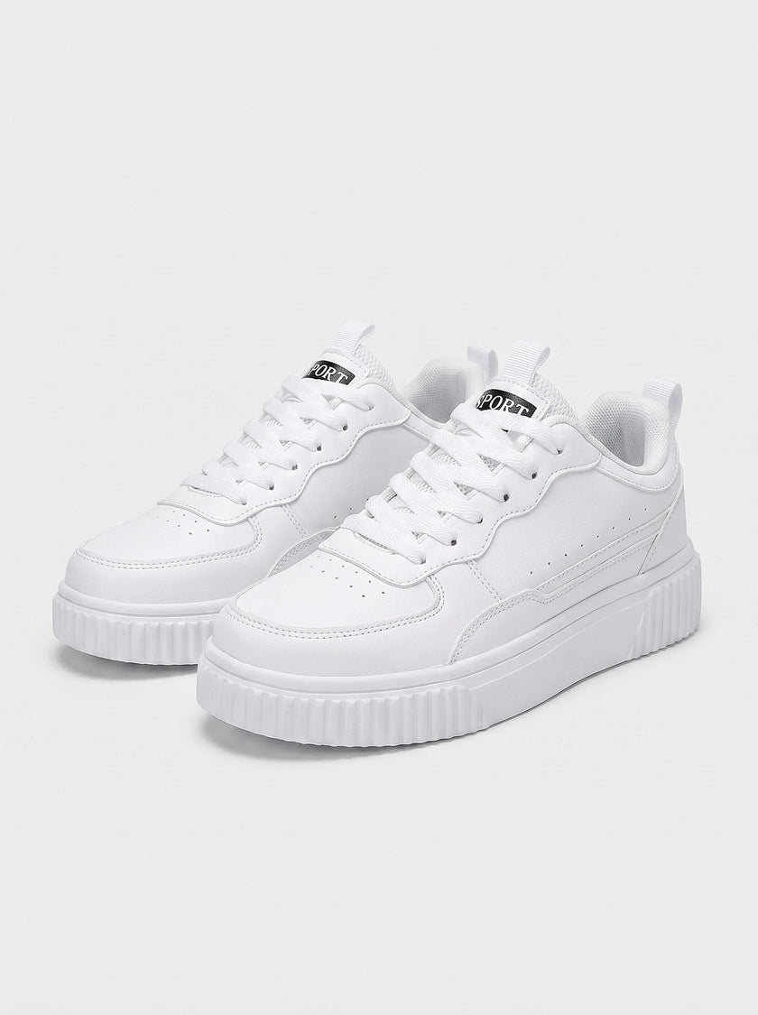 White minimalist men's trainers by FJØRNA, casual and clean design, featuring comfortable shoes for everyday wear.
