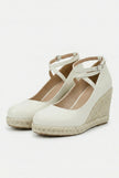 FJØRNA women's ankle-strap wedge sandals with espadrille platform, stylish and elegant for casual or dressy occasions.