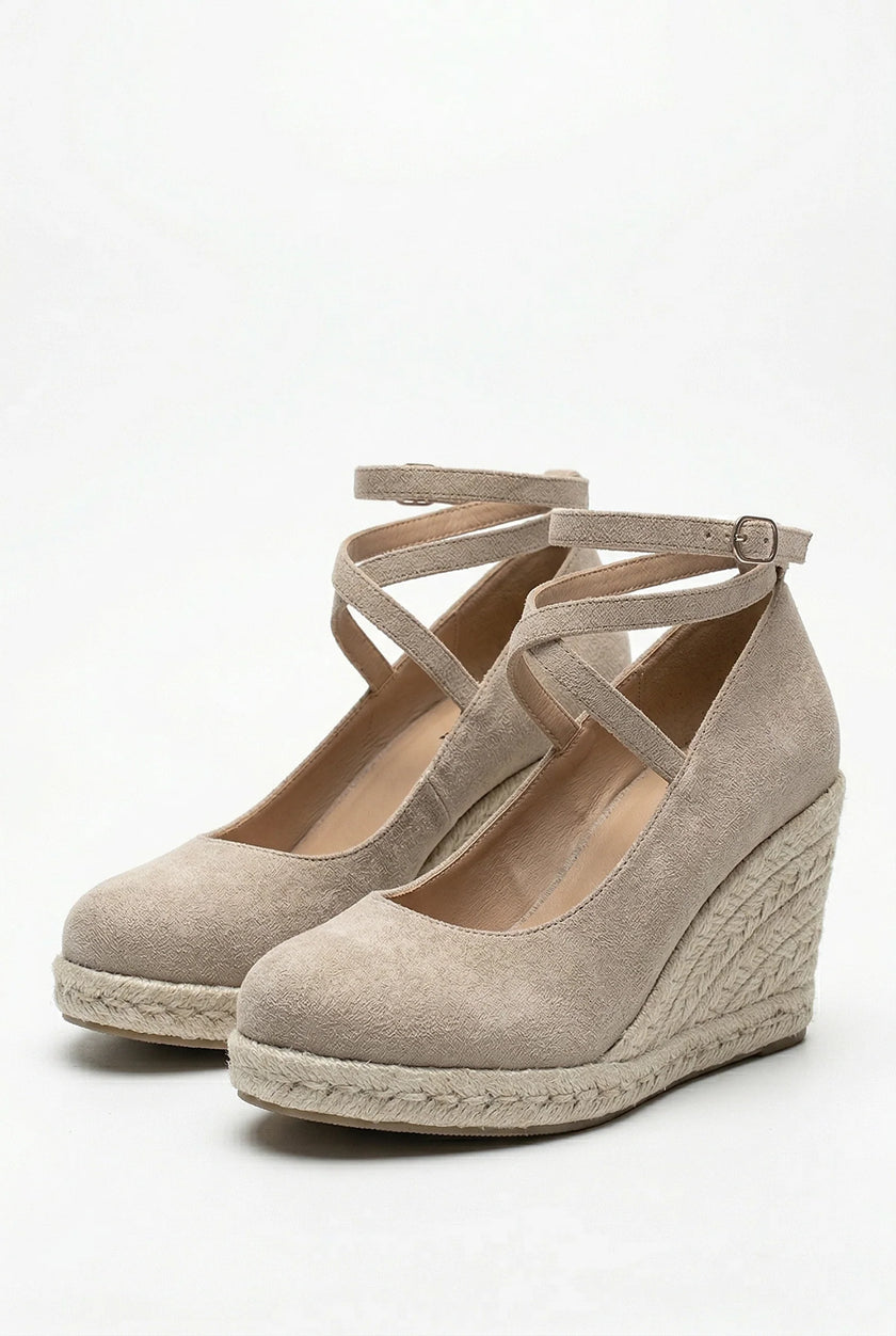 Elegant women's ankle-strap wedge sandals by FJØRNA with espadrille platform and stylish design, shown from the side.