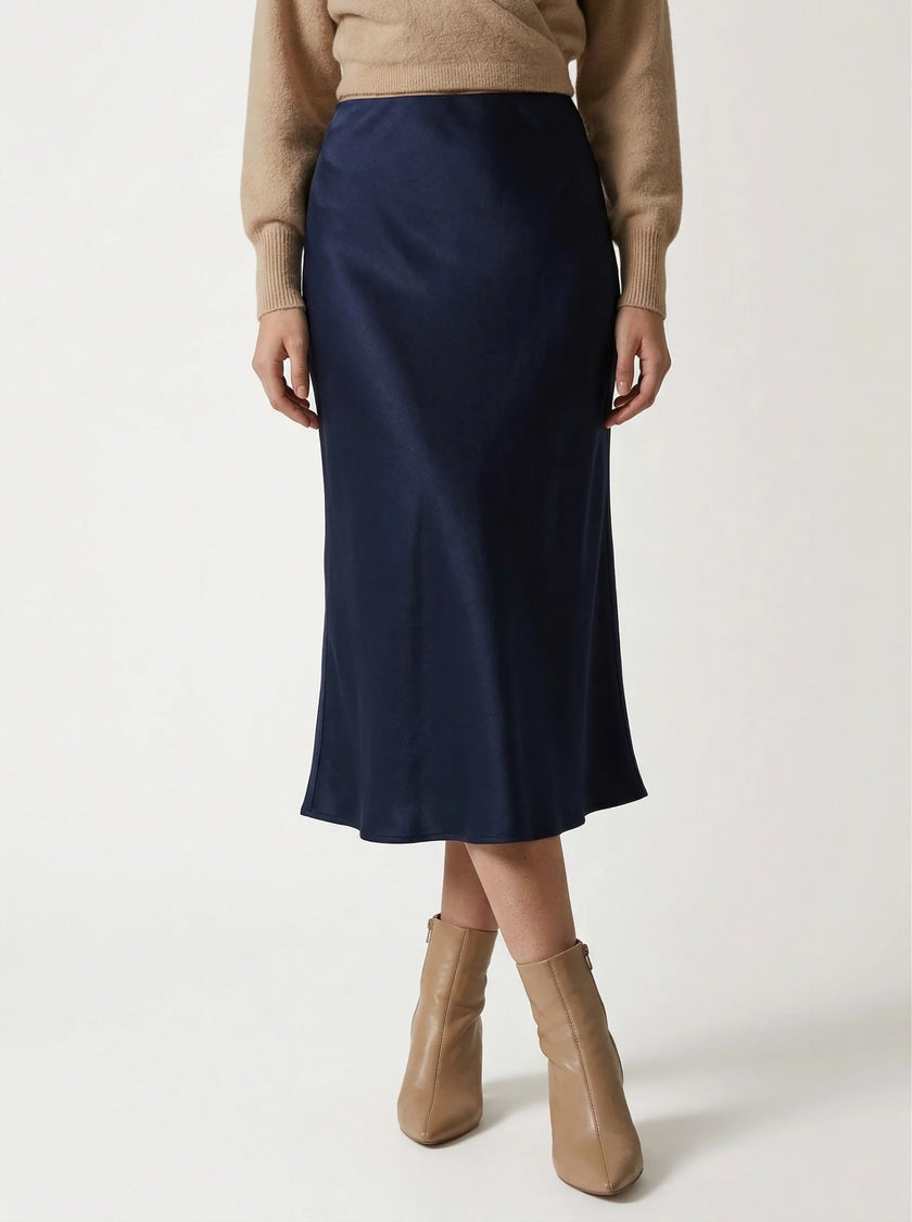 Elegant women's high-waist midi skirt in satin fabric by FJØRNA, flowing and stylish for a sophisticated look