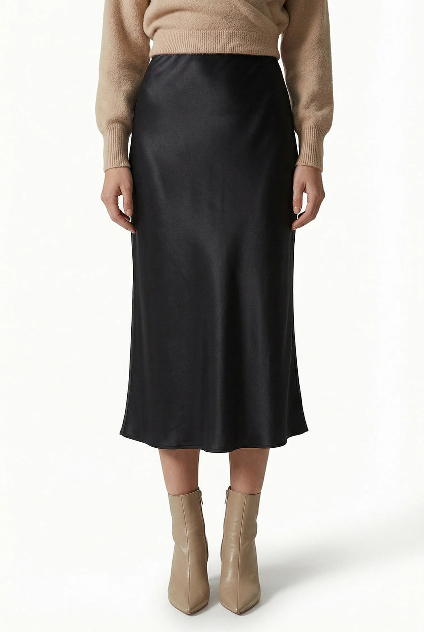 Elegant high-waist midi satin skirt for women, flowing and stylish, by FJØRNA, shown in a natural flowing design.