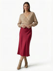 FJØRNA high-waist midi satin skirt for women, elegant flowing design, stylish and versatile for dressy occasions.