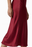 Elegant women's high-waist midi skirt in satin, flowing design by FJØRNA, shown in a stylish variant with a smooth, shiny fabric.