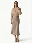 FJØRNA high-waist midi satin skirt for women, elegant flowing design, stylish and sophisticated for dressy occasions.