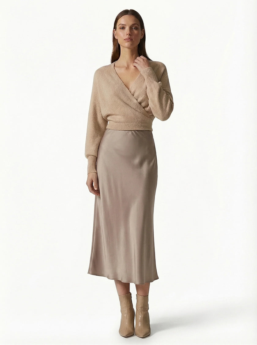 FJØRNA high-waist midi satin skirt for women, elegant flowing design, stylish and sophisticated for dressy occasions.