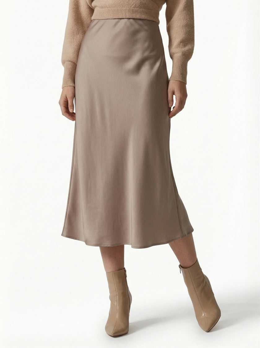 Elegant high-waist midi satin skirt for women by FJØRNA, flowing design with a sophisticated, stylish look.