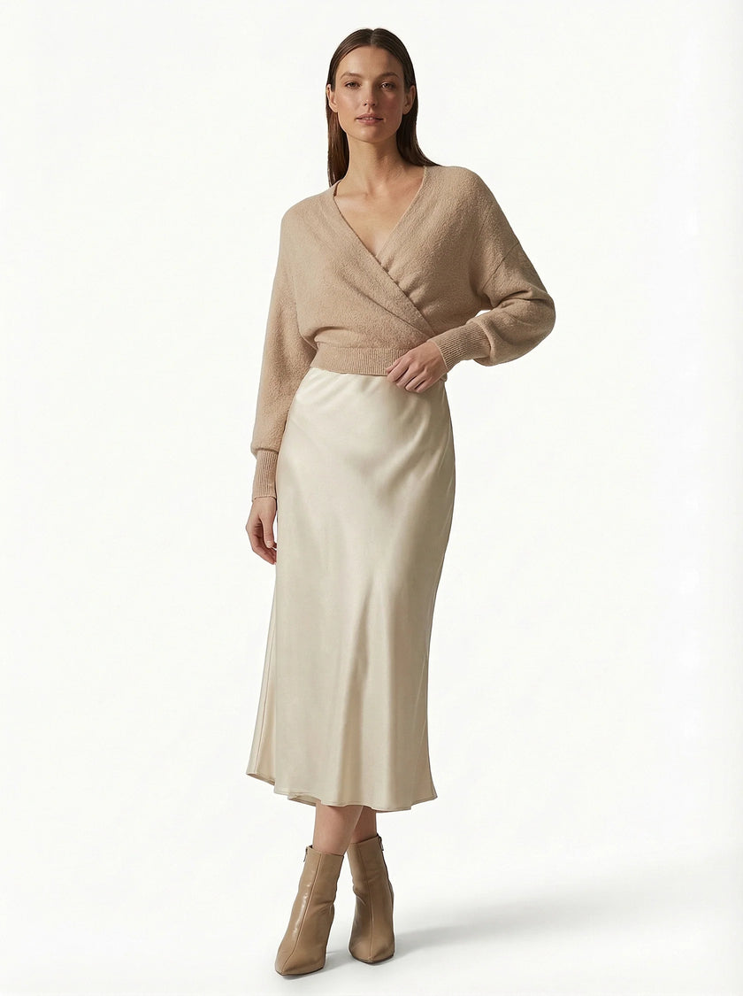 Elegant FJØRNA high-waist midi satin skirt for women, flowing design perfect for sophisticated and stylish looks.