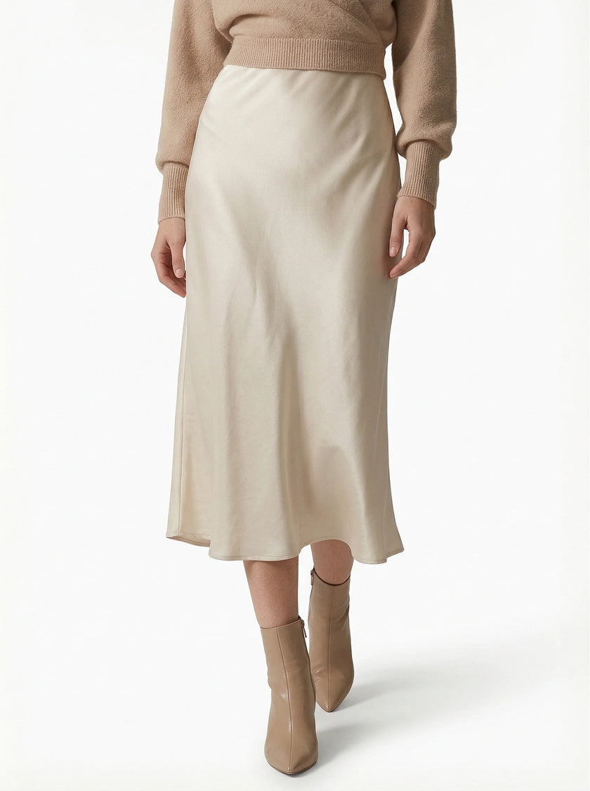 Elegant women's satin high-waist midi skirt with flowing design, showcasing a stylish and sophisticated look.