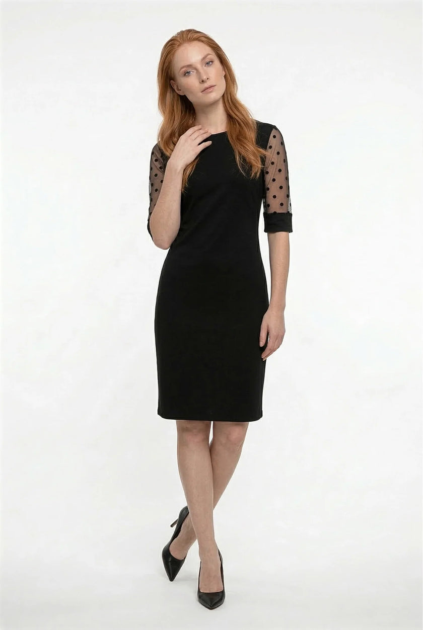 Black midi dress for women by FJØRNA featuring lace sleeves, A-line silhouette, and contrast details in a stylish dress.