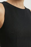 Flowing sleeveless women's maxi dress by FJØRNA, perfect for casual summer wear with an effortless coastal style.
