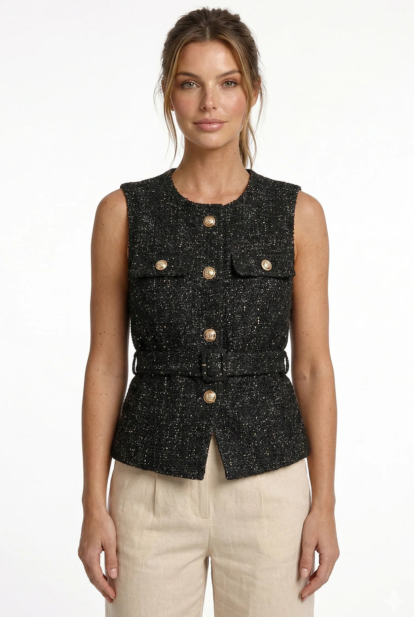 FJØRNA women's tailored sleeveless waistcoat with structured design, layered style, shown in a minimalist setting.