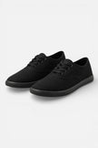 Black breathable women's trainers by FJØRNA, lightweight casual shoes with comfortable fit for everyday wear.