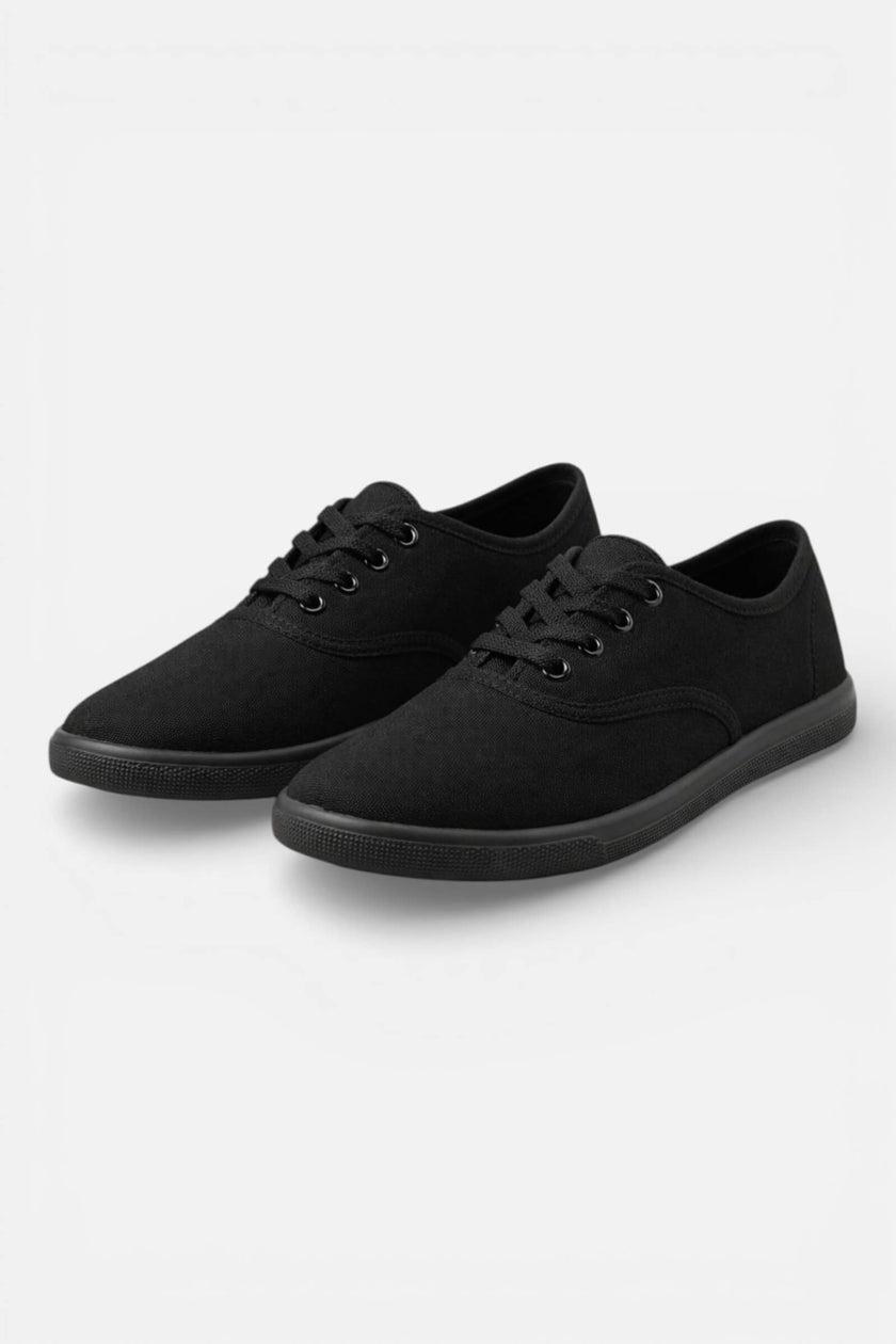 Black breathable women's trainers by FJØRNA, lightweight casual shoes with comfortable fit for everyday wear.